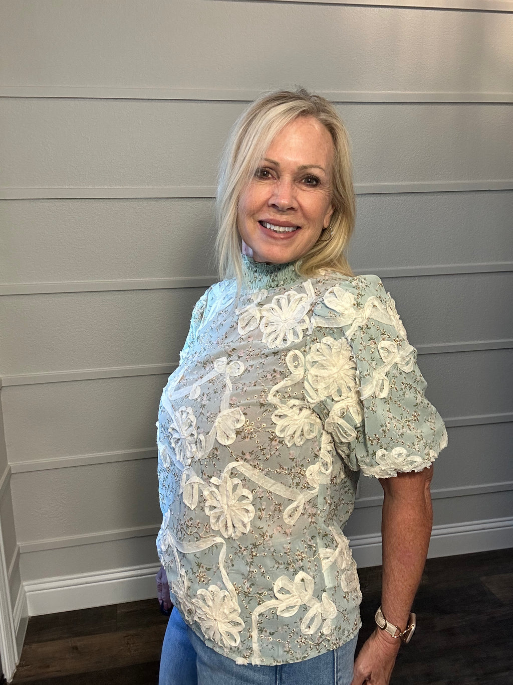 The Garden Party Gossip Mock Neck top